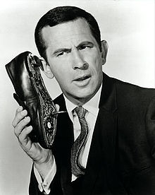 Don Adams using shoe phone