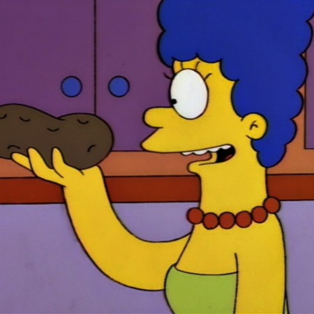Marge Simpson holds potato