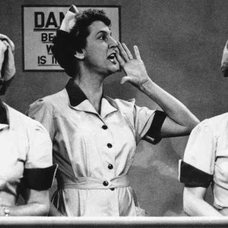 Lucy and Ethel in chocolate factory with mouths full of chocolate